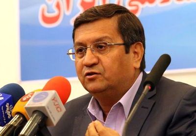 انتقاد همتی از عملکرد کُند شرکت‌های دولتی در ترخیص کالاهای اساسی